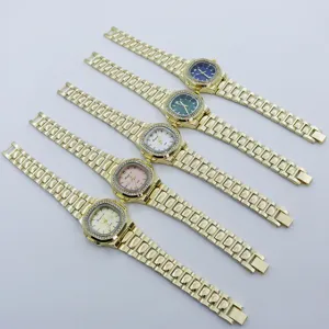 Details of fashionable square rhinestone women watch with gold metal strap and colorful dials.