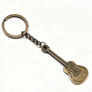Portachiavi con chitarra in metallo bronzo vintage ciondolo regalo per amanti musica