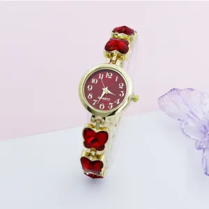 Detailed view of the women quartz watch with red crystal butterfly bracelet and round dial.