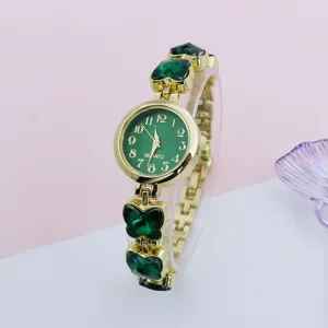 Women's quartz watch with green dial and crystal butterfly bracelet strap for daily fashion.
