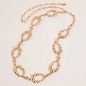 Gold metal chain belt with hollow oval links and adjustable clasp for women fashion.