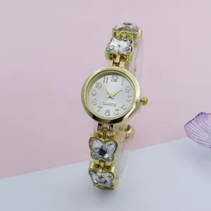 Detailed close-up shot showcasing the sparkling rhinestone butterfly bracelet quartz watch dial.
