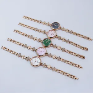 Women fashion clover bracelet watch, elegant quartz wristwatch with delicate leaf chain.