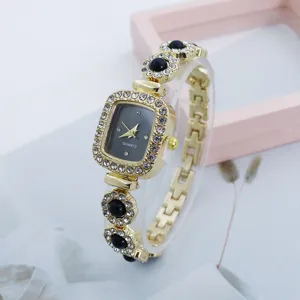 Women fashion square quartz watch with rhinestone bezel and black beaded bracelet strap.
