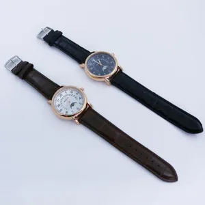 Orologio al quarzo da uomo elegante con cinturino in pelle e quadrante classico design vintage.