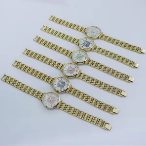 Detail view of gold-tone quartz watches with colorful crystal clover dials and bracelets.