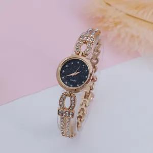 Women quartz watch with starry dial and rhinestones rose gold bracelet fashion gift.