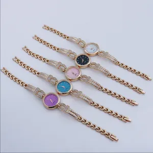 Detail view of fashionable women rhinestone quartz bracelet watch with colorful dial options.