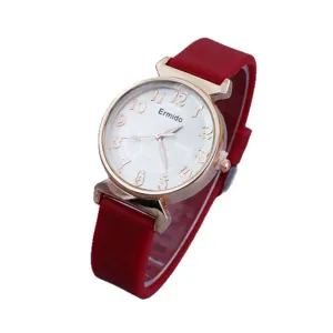 Casual women's quartz watch with red silicone strap, white dial and clear numbers for daily wear.