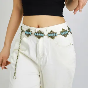 Chaîne de taille en métal turquoise rétro détail montrant un design en alliage pour jeans.