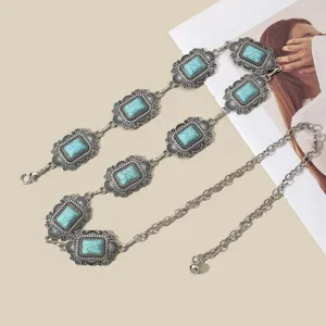 Λεπτομερής όψη vintage έθνος τυρκουάζ αλυσίδας μέσης με περίτεχνη ασημένια μεταλλική σκαλιστή.