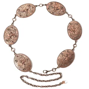 Chaine de taille en metal style western retro avec plaques de crane de taureau pour femmes.