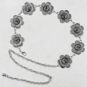 Cadena de cintura de metal plateado retro con delicados dijes de flores huecas, accesorio chic.