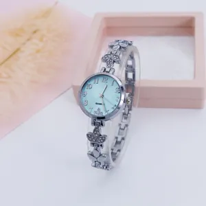 Chic clover bracelet watch for women featuring a light blue dial and quartz movement.