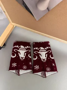 Burgundy winter warm knit leg warmers with cute sheep head and snowflake pattern for girls.