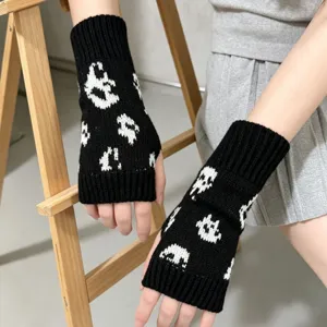 Gants tricotés noirs et blancs sans doigts motif crânes accessoires chauds d'hiver
