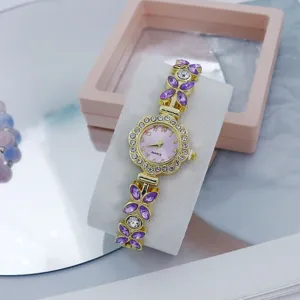 Women fashion quartz watch with pink dial, flower rhinestone bezel and purple crystal strap.