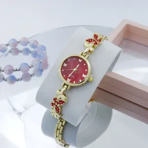 Gouden quartz dameshorloge met rode wijzerplaat strass vlinder ketting armband mode