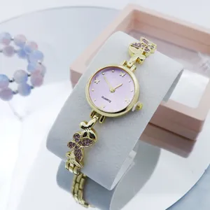 Dames mode quartz horloge goudkleurig vlinder armband horloge roze wijzerplaat cadeau