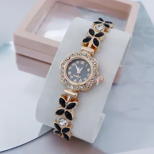 Exquisite women's quartz watch featuring a rhinestone flower dial and crystal bracelet.