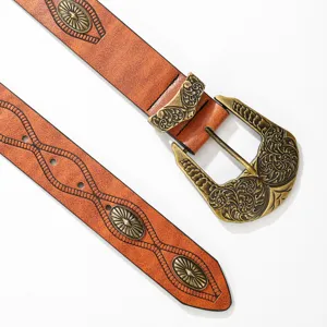Retro vintage embossed women PU leather belt with floral metal buckle detailed view.
