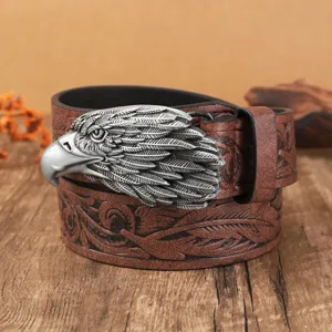 Ceinture en cuir style western vintage avec boucle de métal aigle et sangle gravée détail