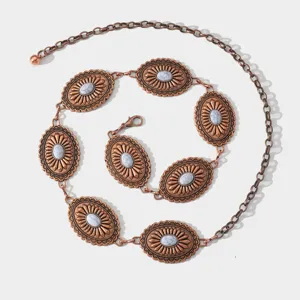 Chaine de taille en metal de style boheme western vintage avec des medaillons ovales.