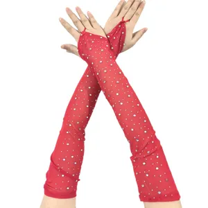 Detailed close-up of red mesh long gloves featuring sparkling rhinestones and cutout finger design.
