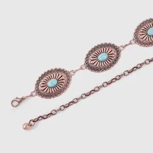 Vue détaillée d'une chaîne de taille en métal turquoise western vintage, ceinture femme.