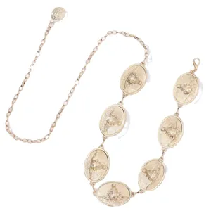 Chaîne de taille en métal doré vintage pour femmes avec pendentifs ovales tête de taureau.
