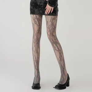 Grey floral fishnet tights featuring intricate lace pattern, elegant fashion hosiery.