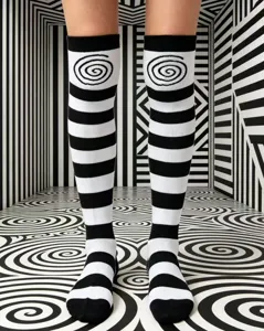 Black and white striped over-the-knee socks with a trendy swirl pattern for women's daily wear.