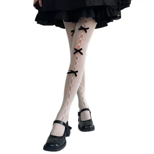 Japanische JK Stil weiße hohle Netzstrumpfhose mit schwarzen Samtschleifen, süße Strümpfe.