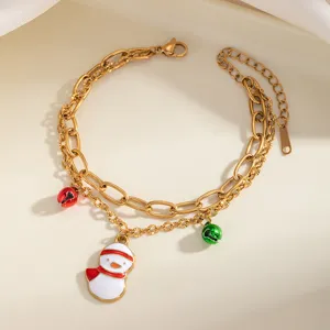 Bracciale in acciaio dorato a doppia catena con ciondolo pupazzo di neve e campanelli festivi.