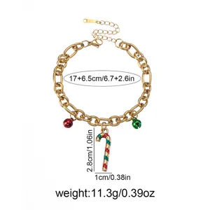 Gold-colored chunky chain bracelet featuring Christmas candy cane and bell charms for women.