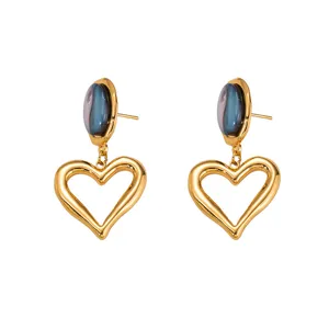 Elegant gold cat-eye stone heart earrings, chic hollow design for daily retro fashion style.