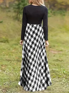Back view of a long sleeve patchwork maxi dress with black top and black white plaid skirt