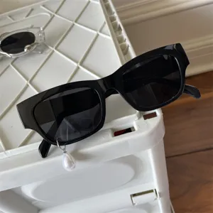 Trendige Sonnenbrille mit Perlenanhänger für Damen und Herren, schwarze Cateye Sonnenbrille.