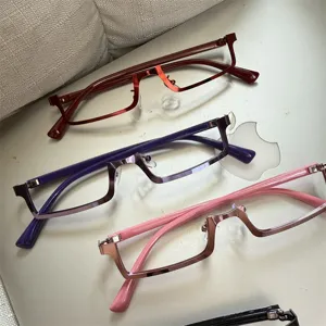 Cyberpunk Y2K style lower half-frame glasses detail shot, unique cosplay fashion accessory.