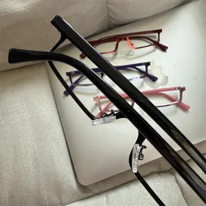 Detailed close-up of half-frame glasses in multiple colors, perfect for cyber and cosplay styling.