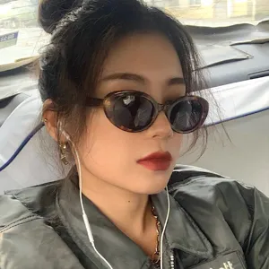 Vintage Katzenauge Sonnenbrille Damen, retro ovale Sonnenbrille mit schickem Schildpatt-Gestell.