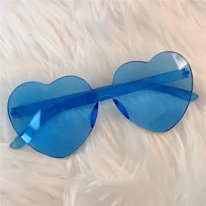 Blaue herzförmige Sonnenbrille für Damen, süße transparente rahmenlose Party Brillen.