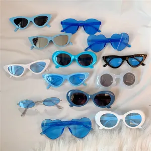 Modisches Sonnenbrillen Set mit Katzenauge, Herz und ovalen Formen. Ideal für Partys.