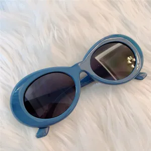 Modische blaue retro dicke ovale sonnenbrille fuer damen, stylische katzenaugen sonnenbrille.