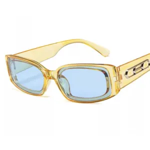 Detailansicht der Retro Sonnenbrille mit bernsteinfarbener Fassung und blauen Gläsern, Metall.