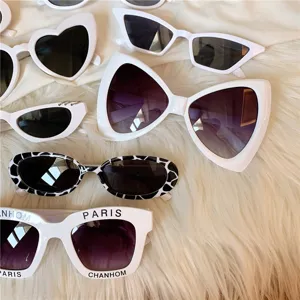 Retro white sunglasses set, unique vintage cat eye and heart shaped shades for women.