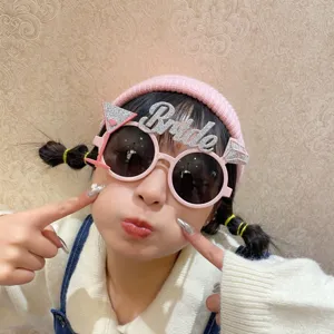 Fun bride novelty sunglasses with glitter letter and diamond ring for bachelorette party props.