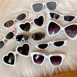 White frame sunglasses vintage retro heart cat eye oval fashion eyewear for women and men.