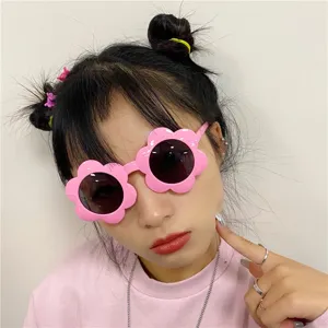 Pink flower novelty sunglasses for party photo props and funny festival costume dress up