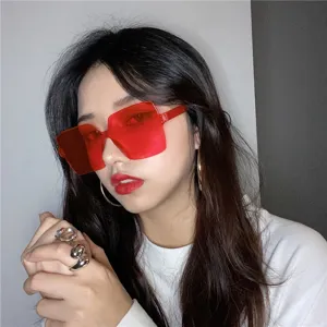 Trendy oversized square red sunglasses for women, vintage street style fashion eyewear.